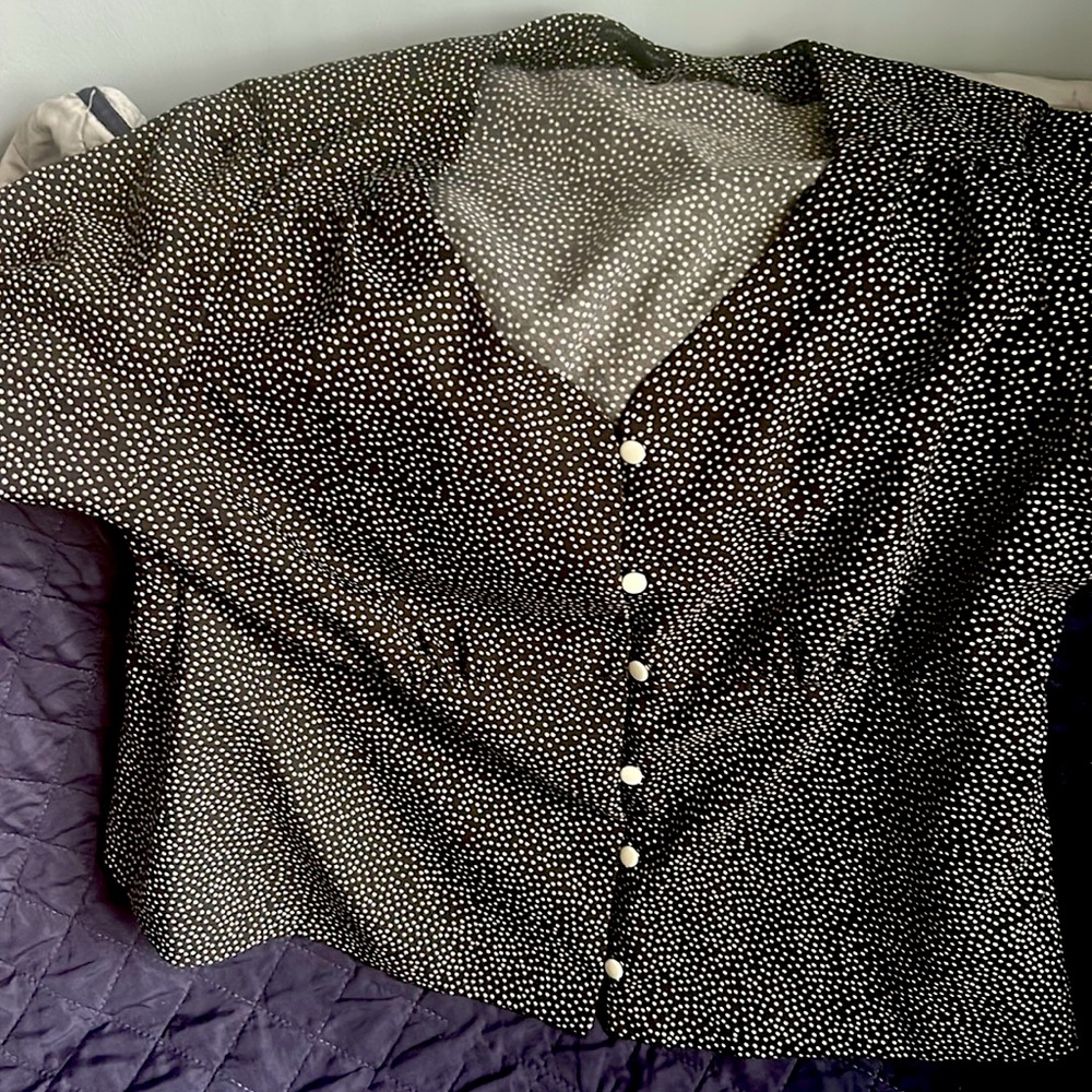 Used button up shirt in good condition.